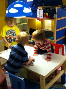 Just our size at Ikea Kids (Get off the table, kid!)