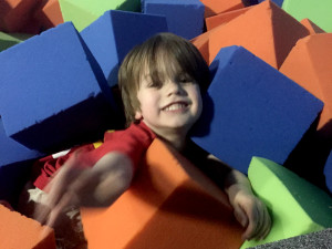 Buried in foam blocks at Flight Trampoline Park The Joy Troupe NOVA